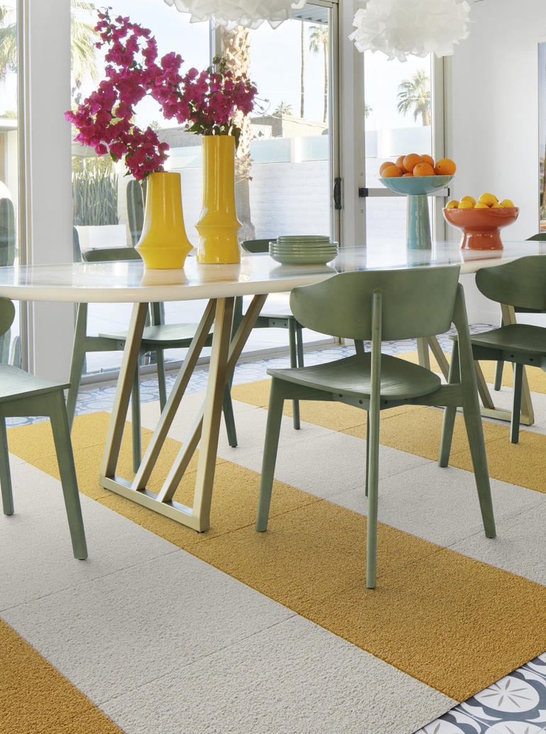 FLOR Heaven Sent kitchen table area rug shown in Marigold and Bone